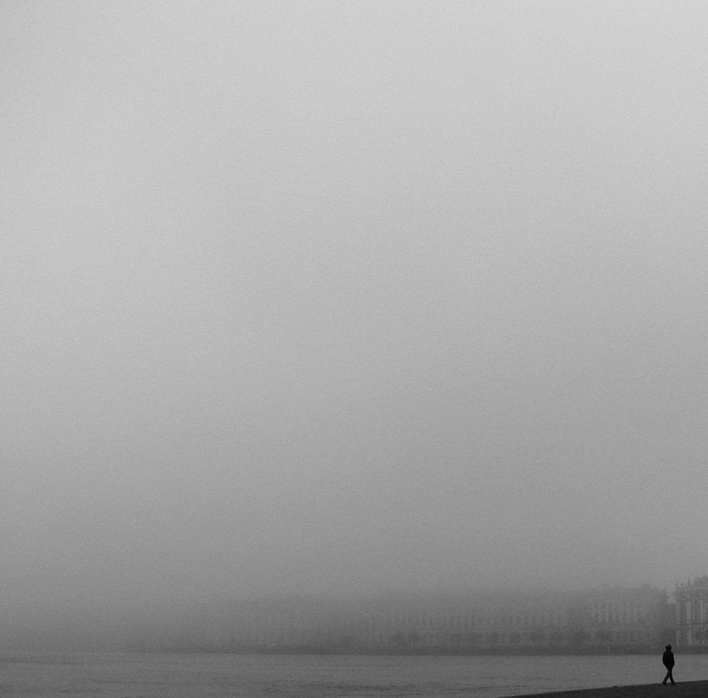 Lone Figure Foggy City