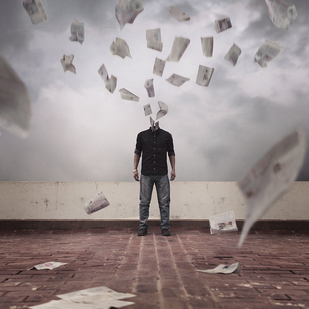 Man with Floating Paper Head