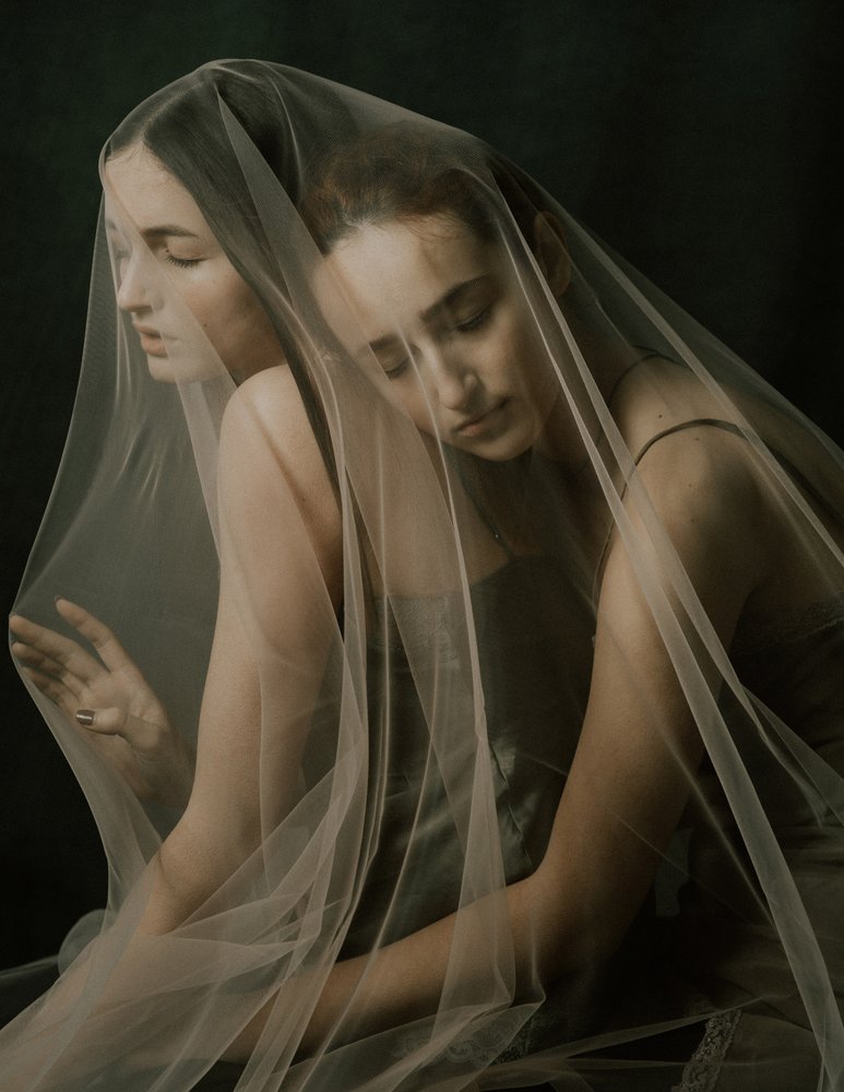 Pensive Veiled Women