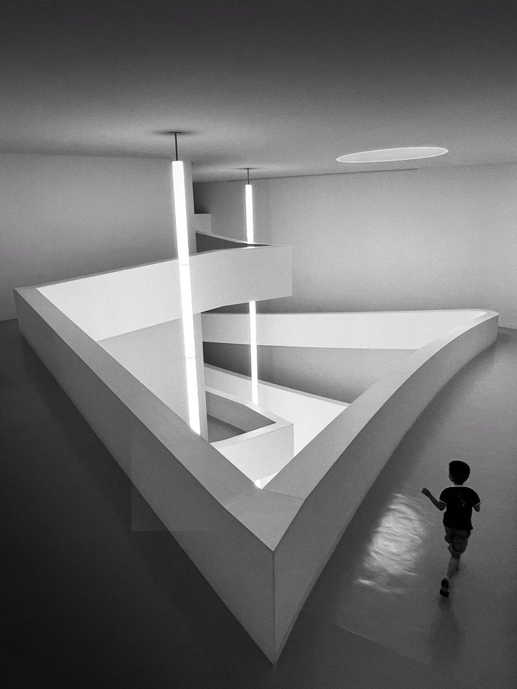 Boy in Geometric Gallery