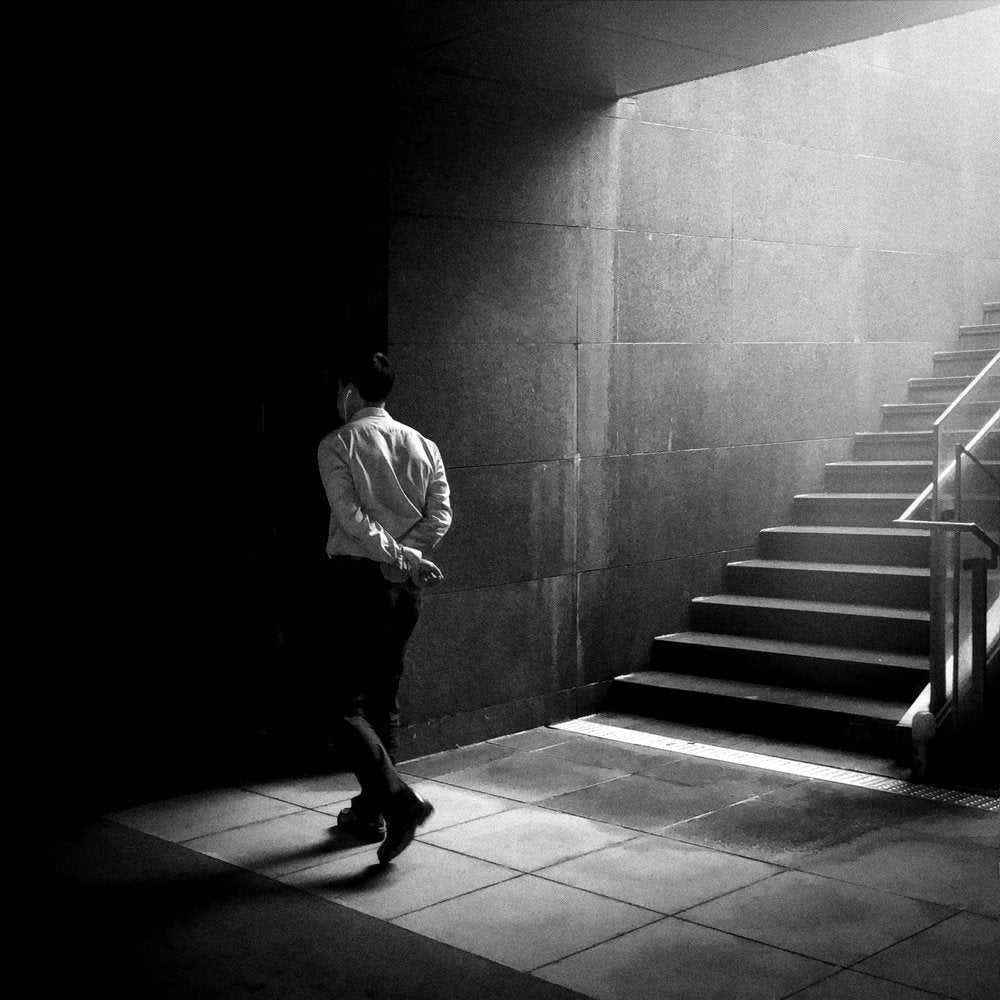 Man Steps Into Light