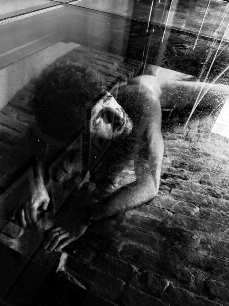 Man Behind Glass
