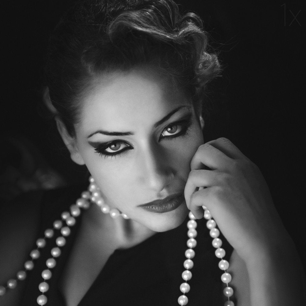 Dramatic Woman With Pearls