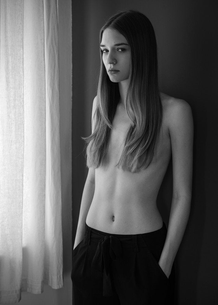 Pensive Woman Window Light