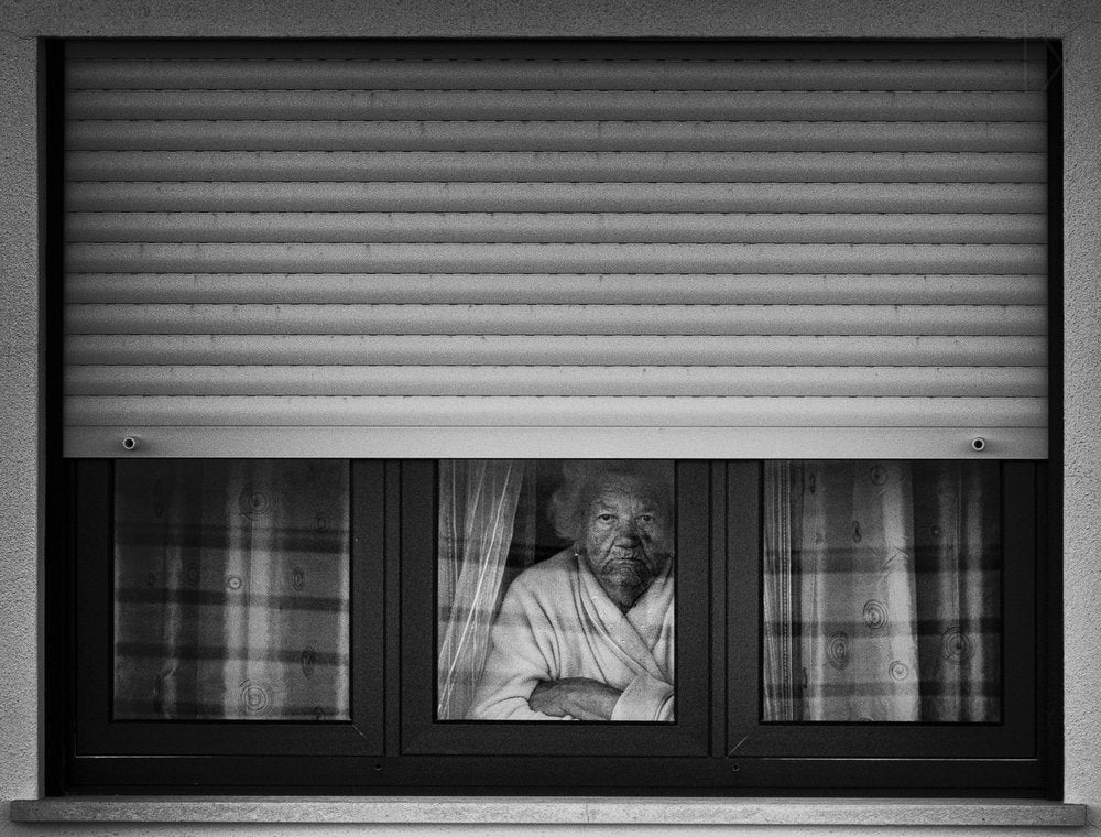 Solitary Woman Window