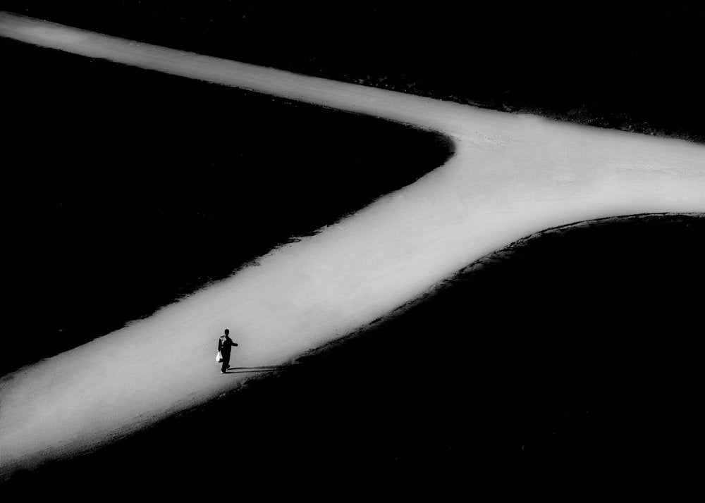 Man At The Crossroads