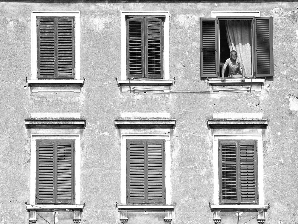 Man in Open Window