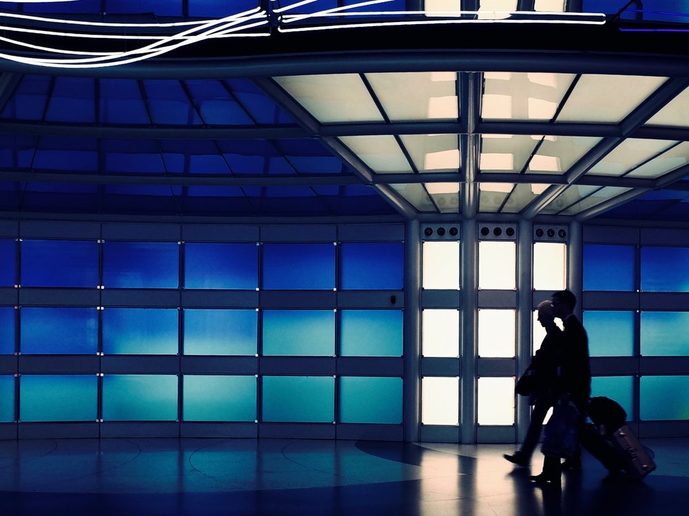 Travelers in Blue Light
