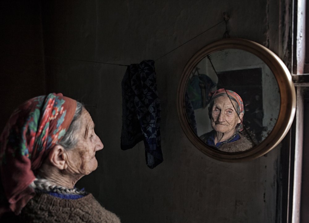 Woman In Mirror Portrait