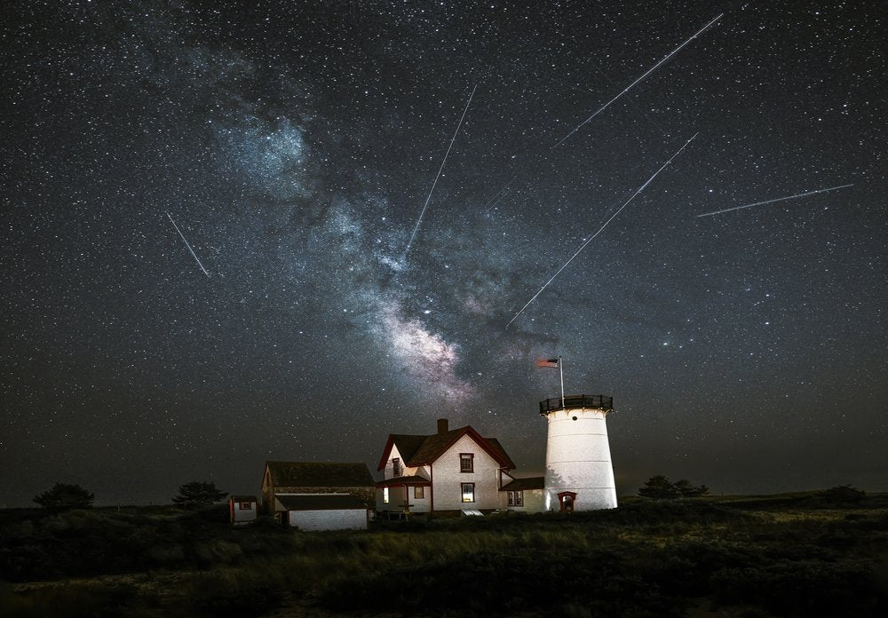 Lighthouse Under Starry Sky