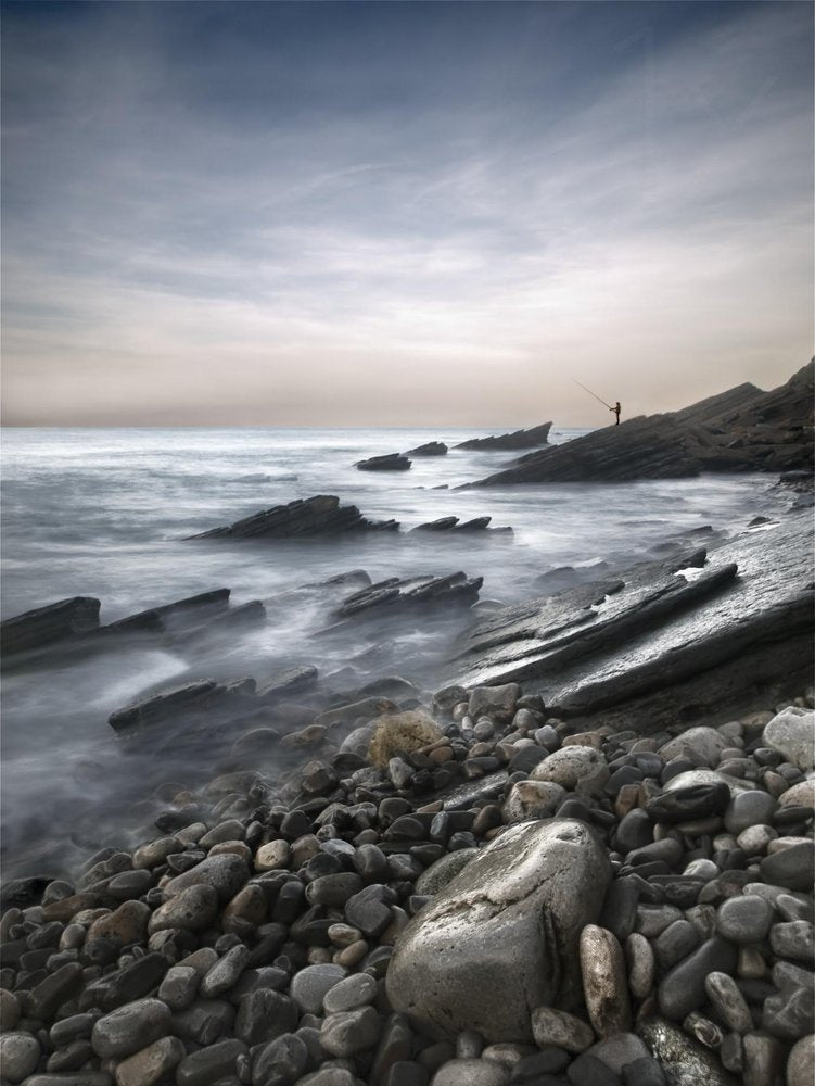 Misty Coastline Fisherman