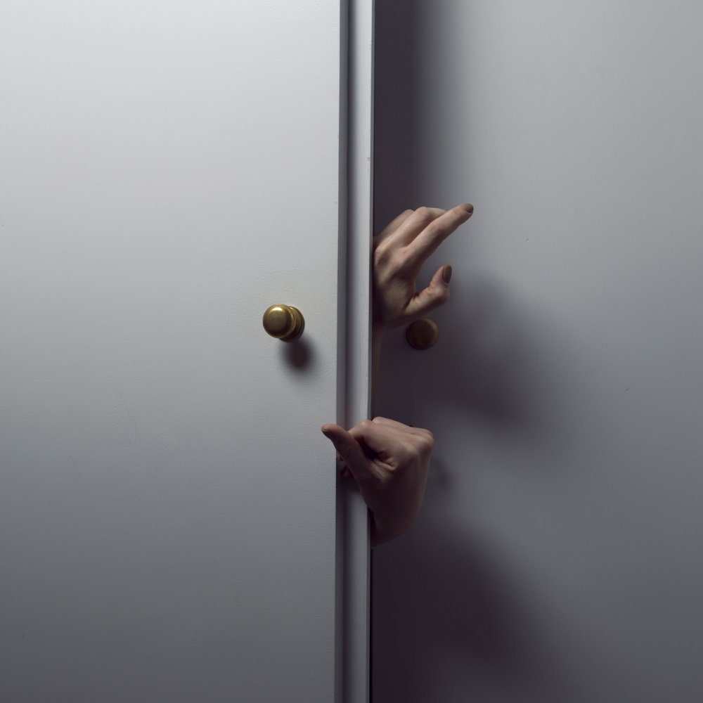 Curious Hands White Door