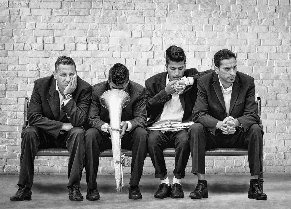 Four Musicians Waiting