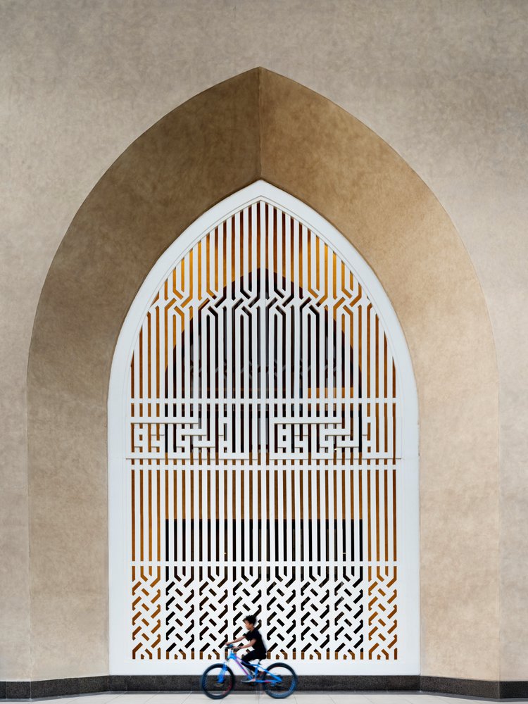 Geometric Arch and Cyclist