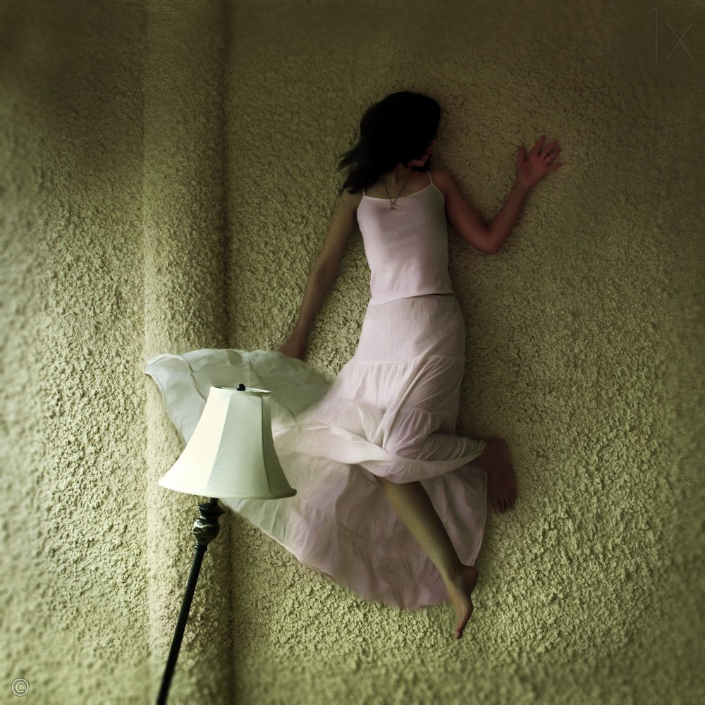Woman Floating on Carpet