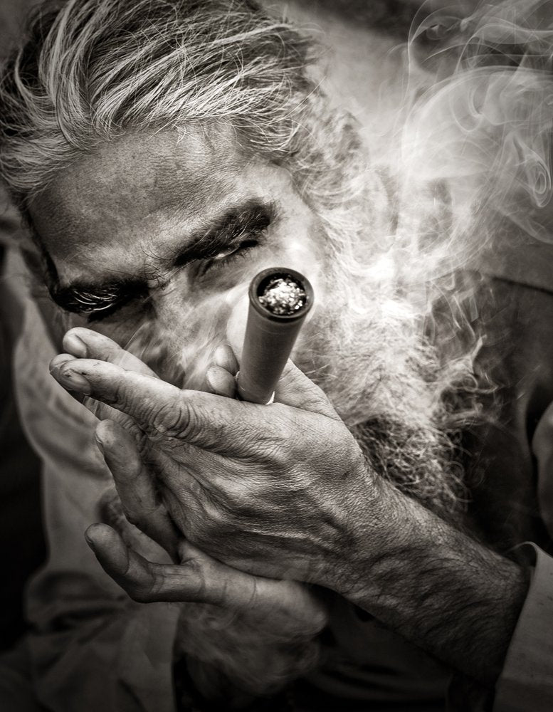 Bearded Man Smoking Pipe