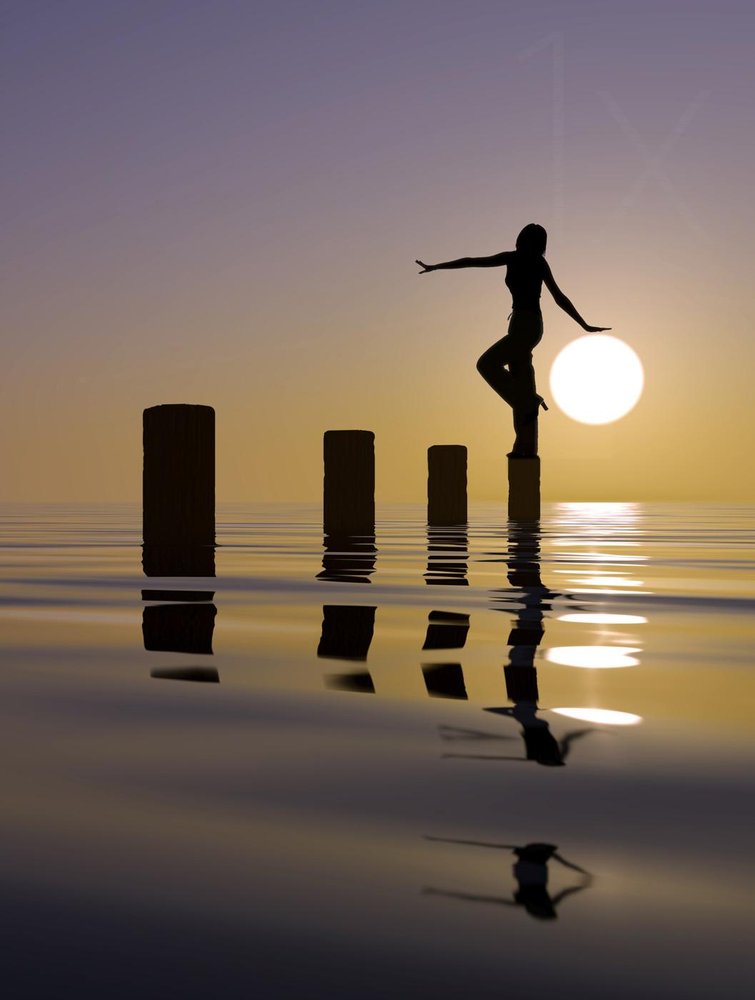 Balancing Sunset Silhouette