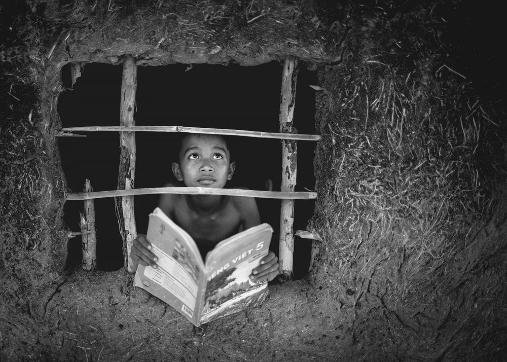Hopeful Boy Reading