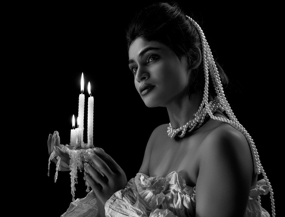 Lady with burning candle