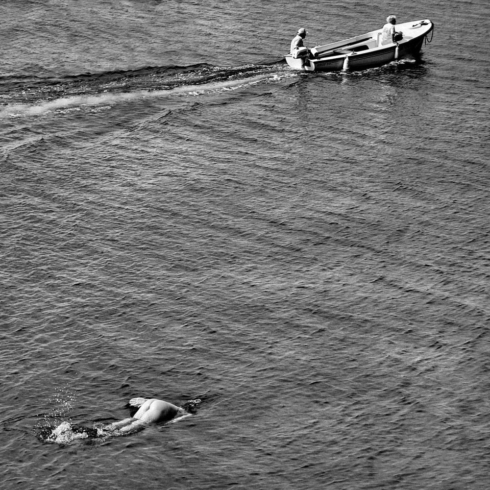Nude Swimmer And Boat