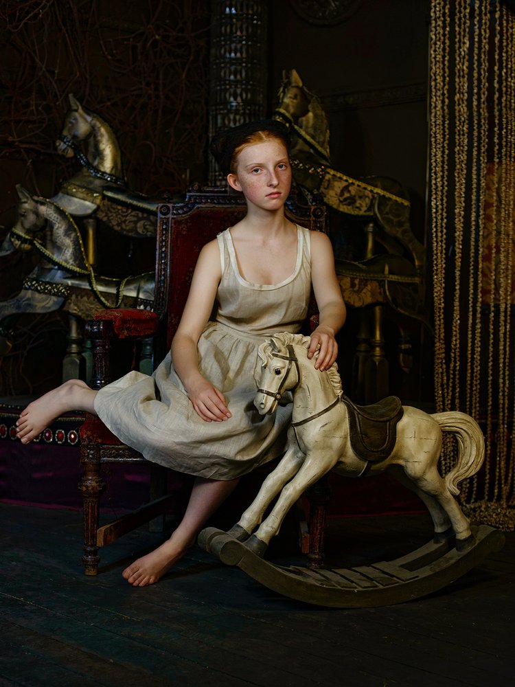 Pensive Girl Rocking Horse