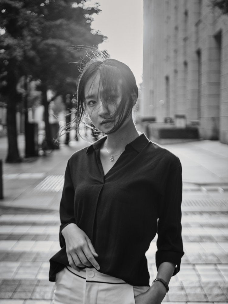 Reflective Urban Woman