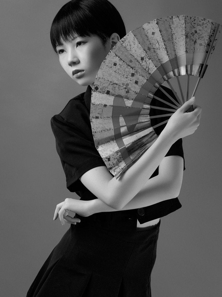 Elegant Woman With Fan