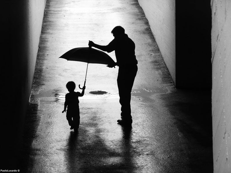 Father's Protective Umbrella