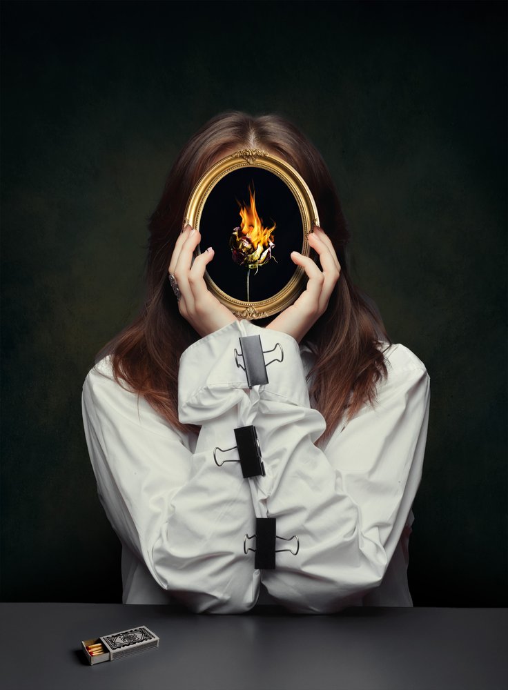 Woman With Burning Rose