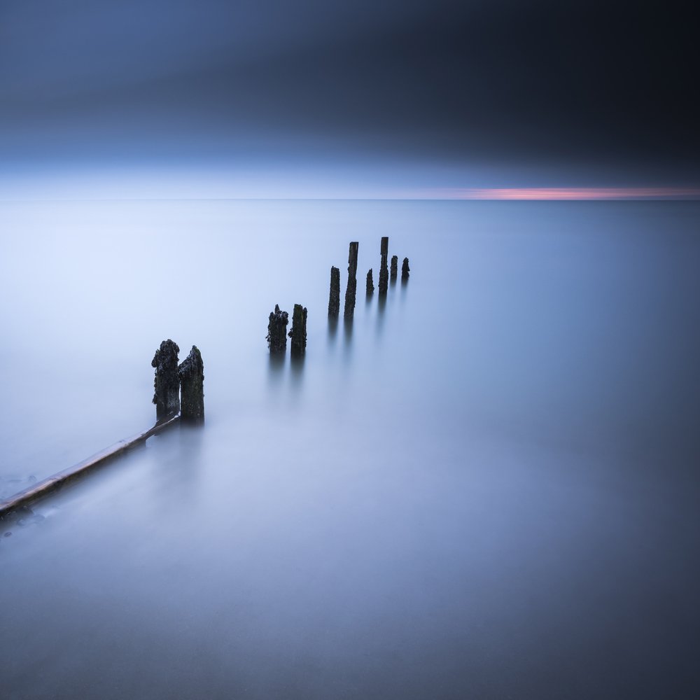 Ocean Posts Horizon Glow