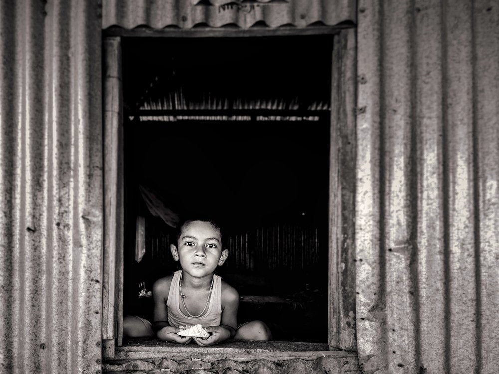 Child in Corrugated Window
