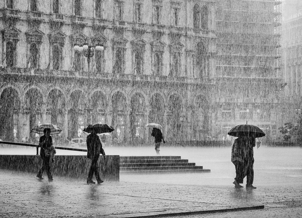 People Walking In Rain