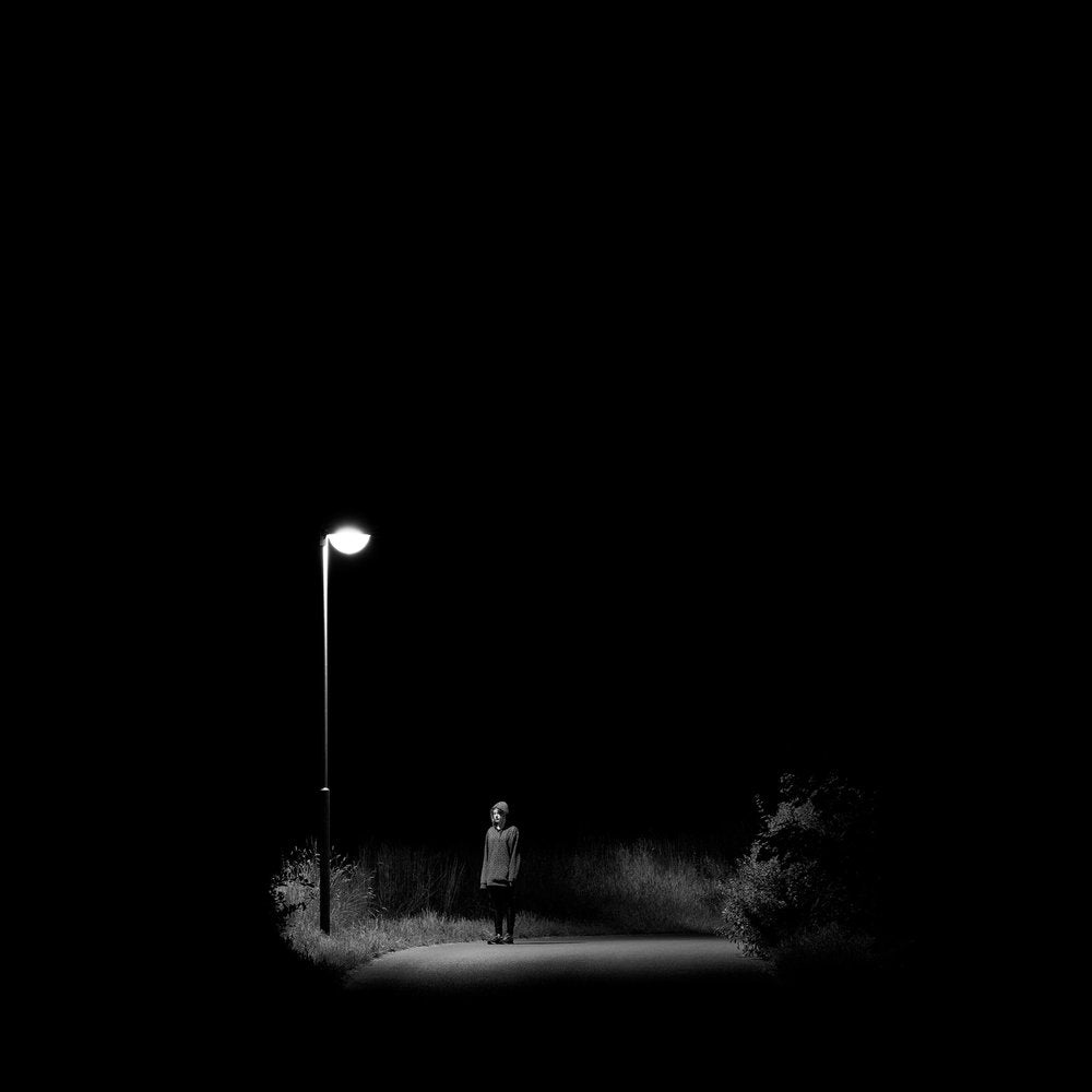 Woman Under Streetlight