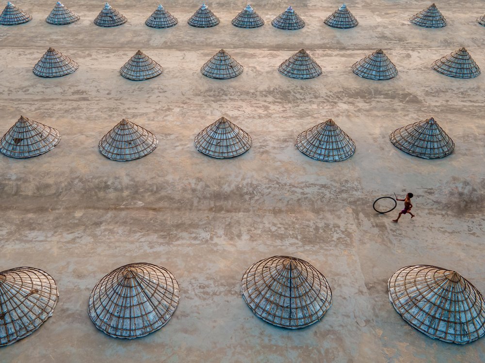 Child Running Among Cones