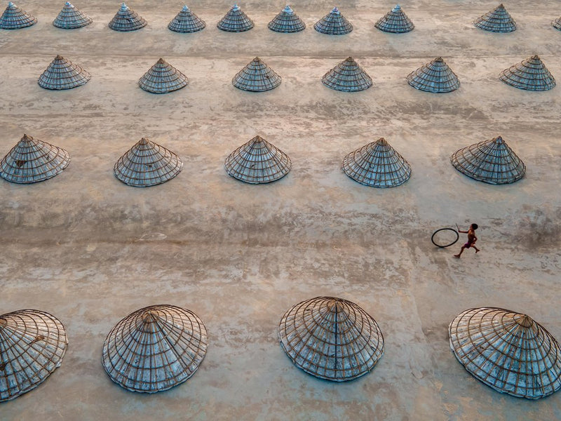Child Running Among Cones