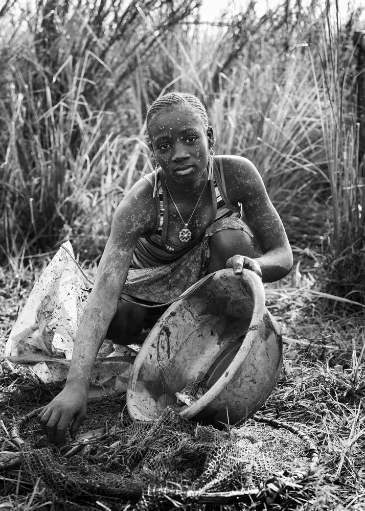 African Girl Fishing