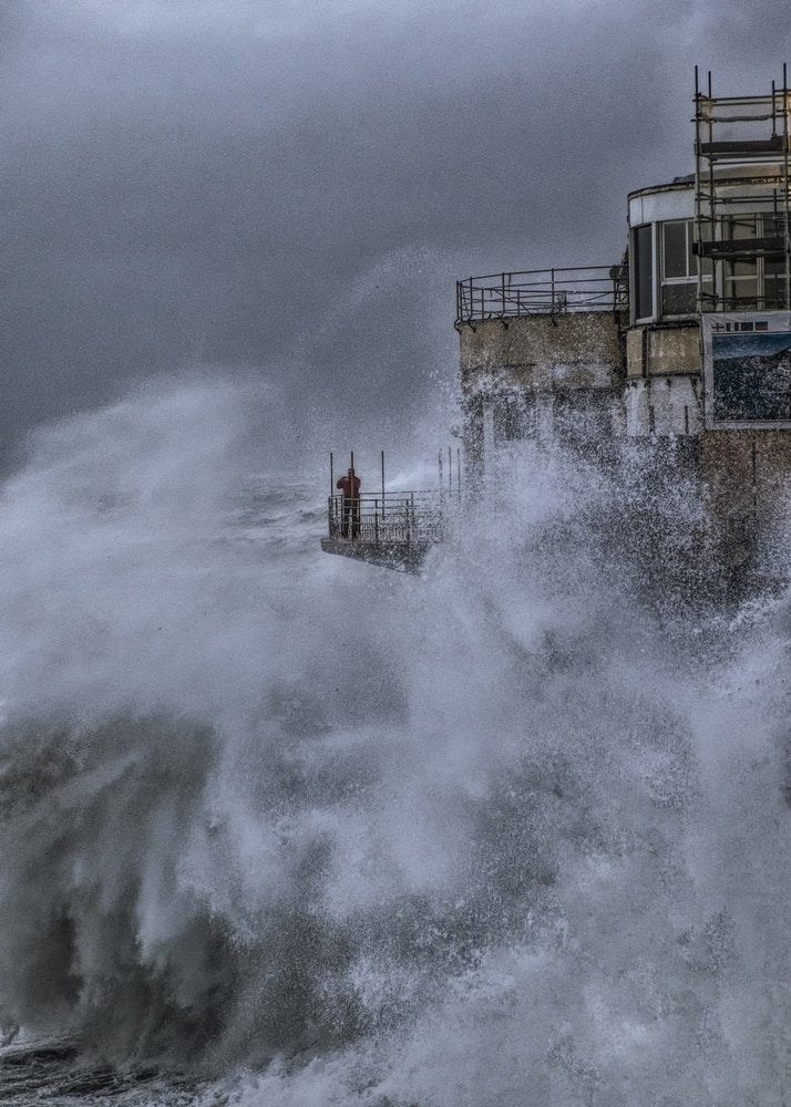 Man Watches Storm Waves