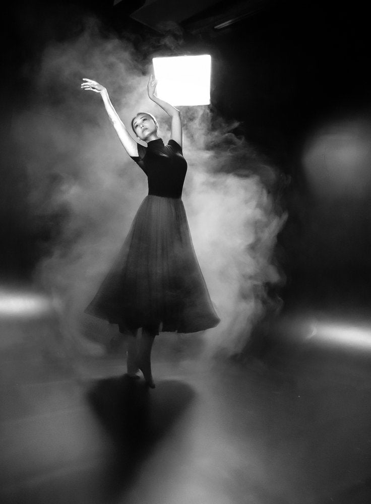 Glowing Dancer In Smoke