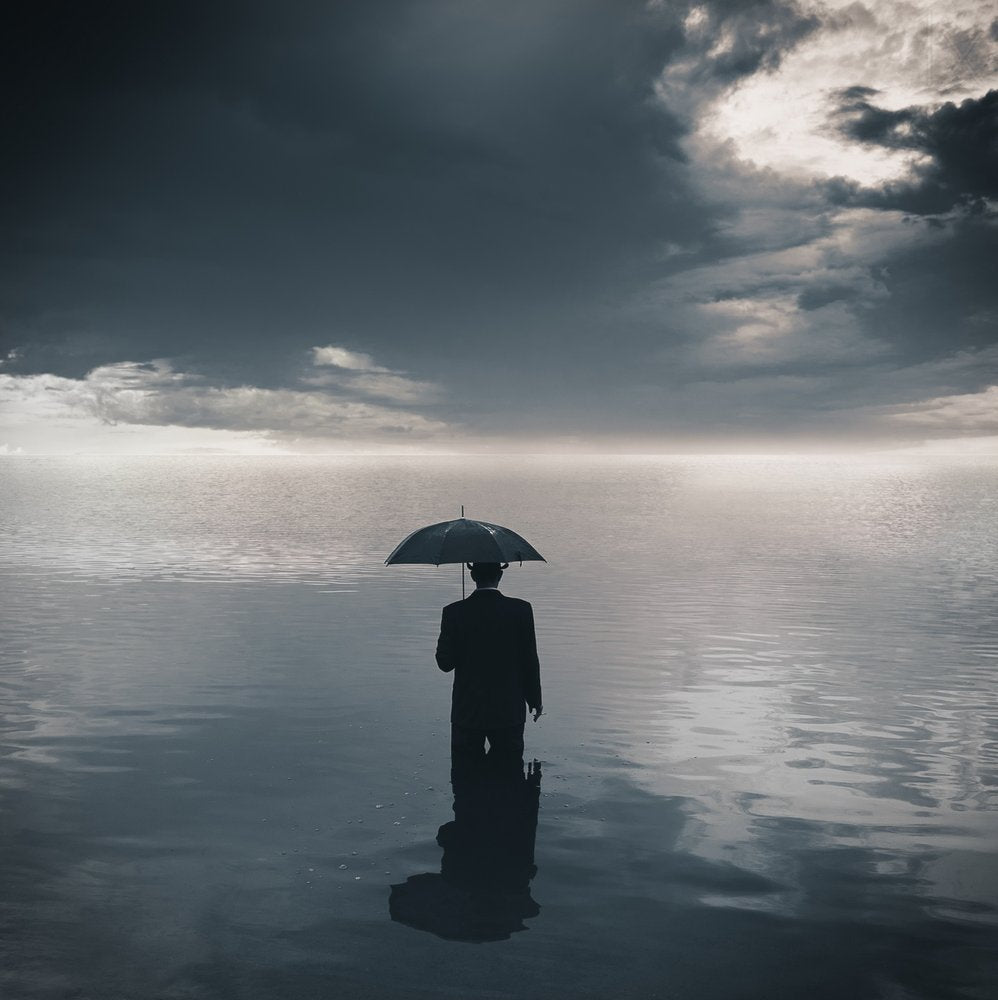 Man Under Stormy Sky