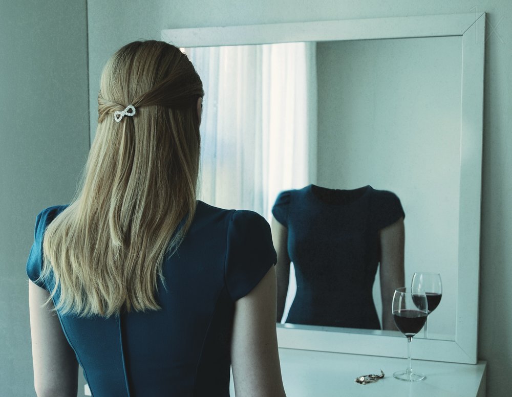 Woman's Headless Reflection