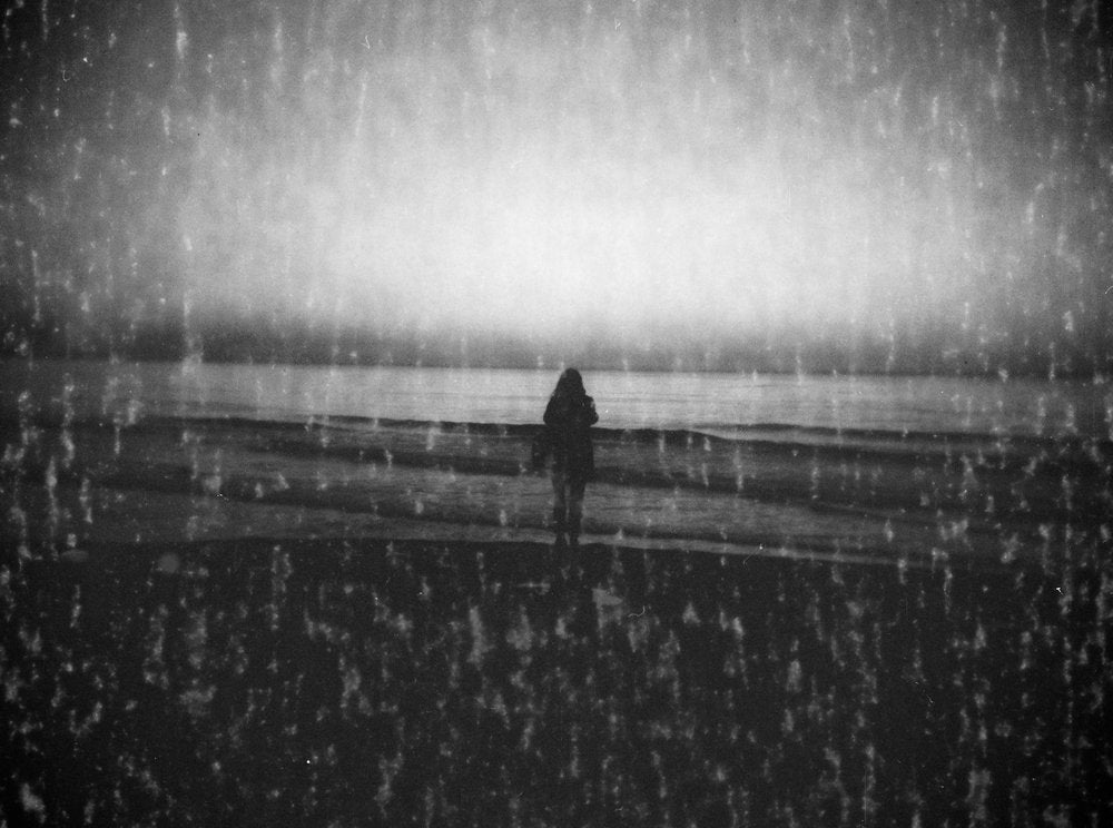 Contemplative Beach Woman