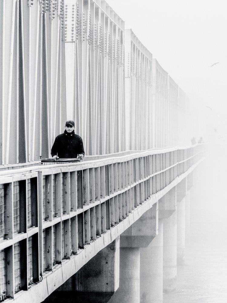 Man on a Misty Bridge