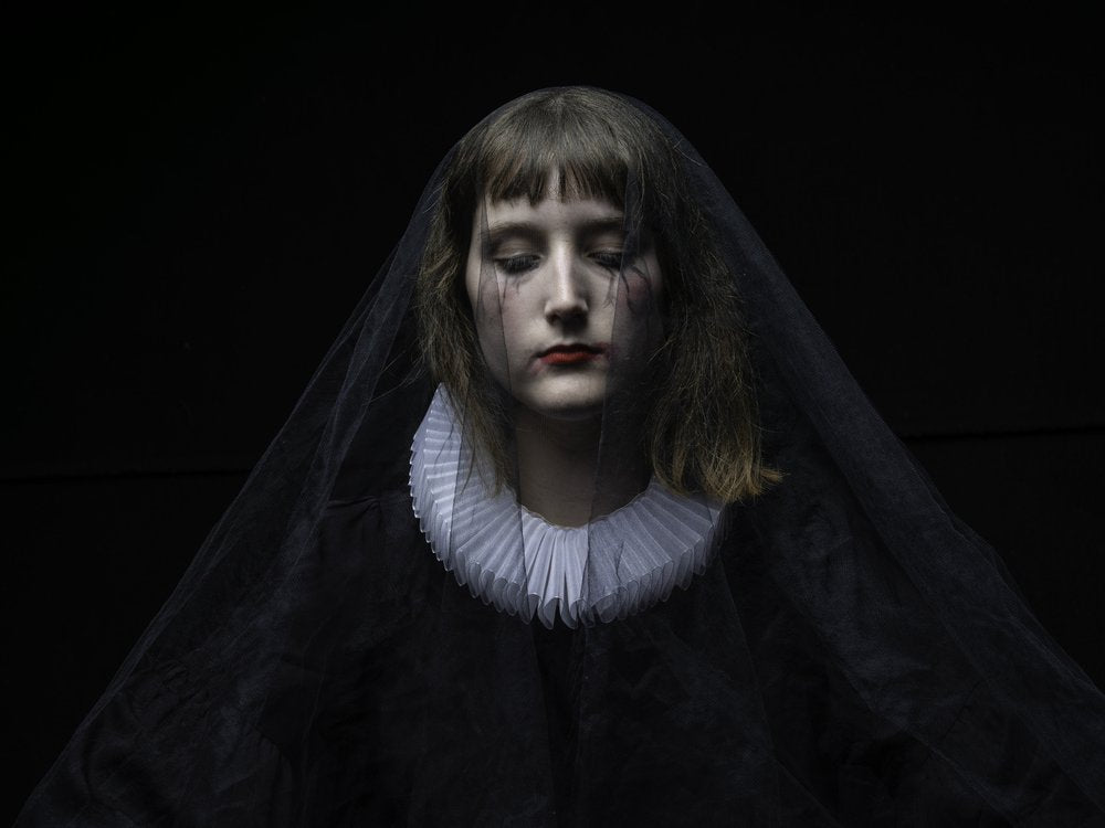 Melancholy Veiled Woman