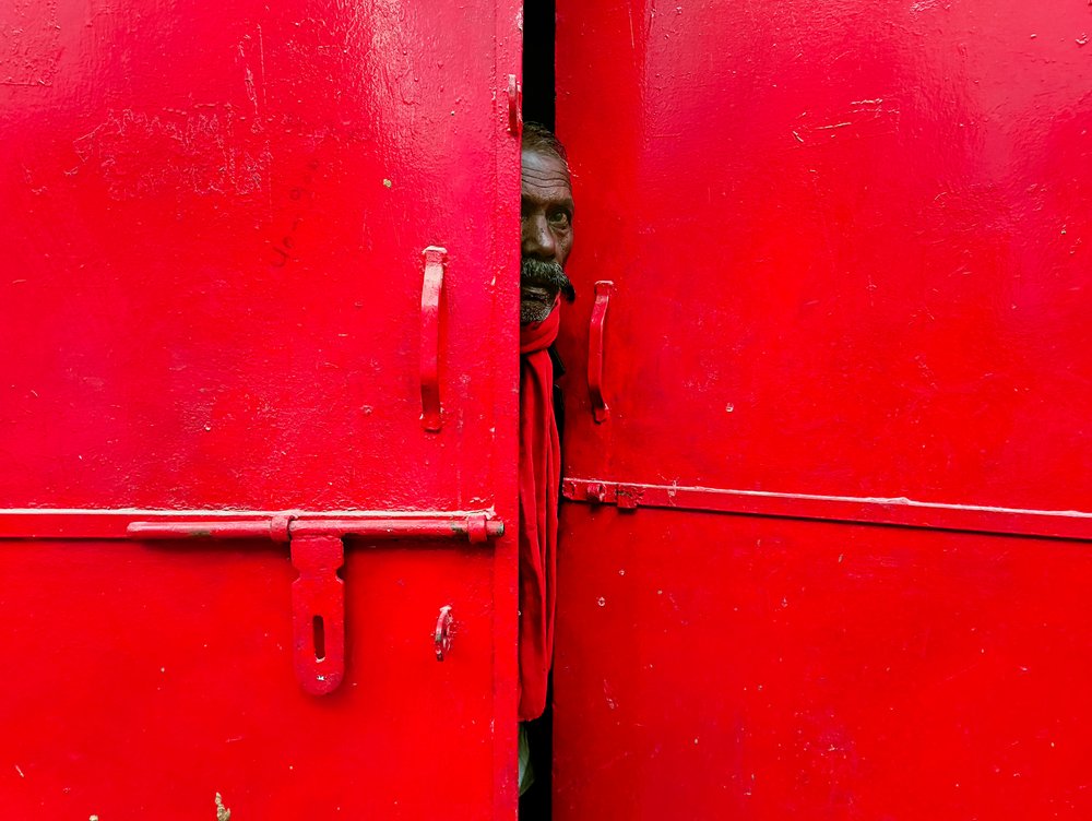 Curious Man Red Door