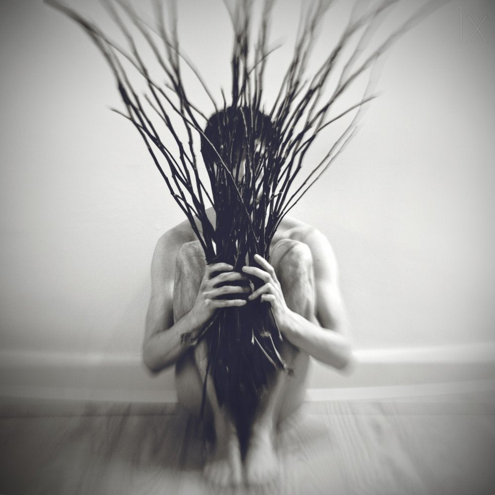 Figure Holding Branches
