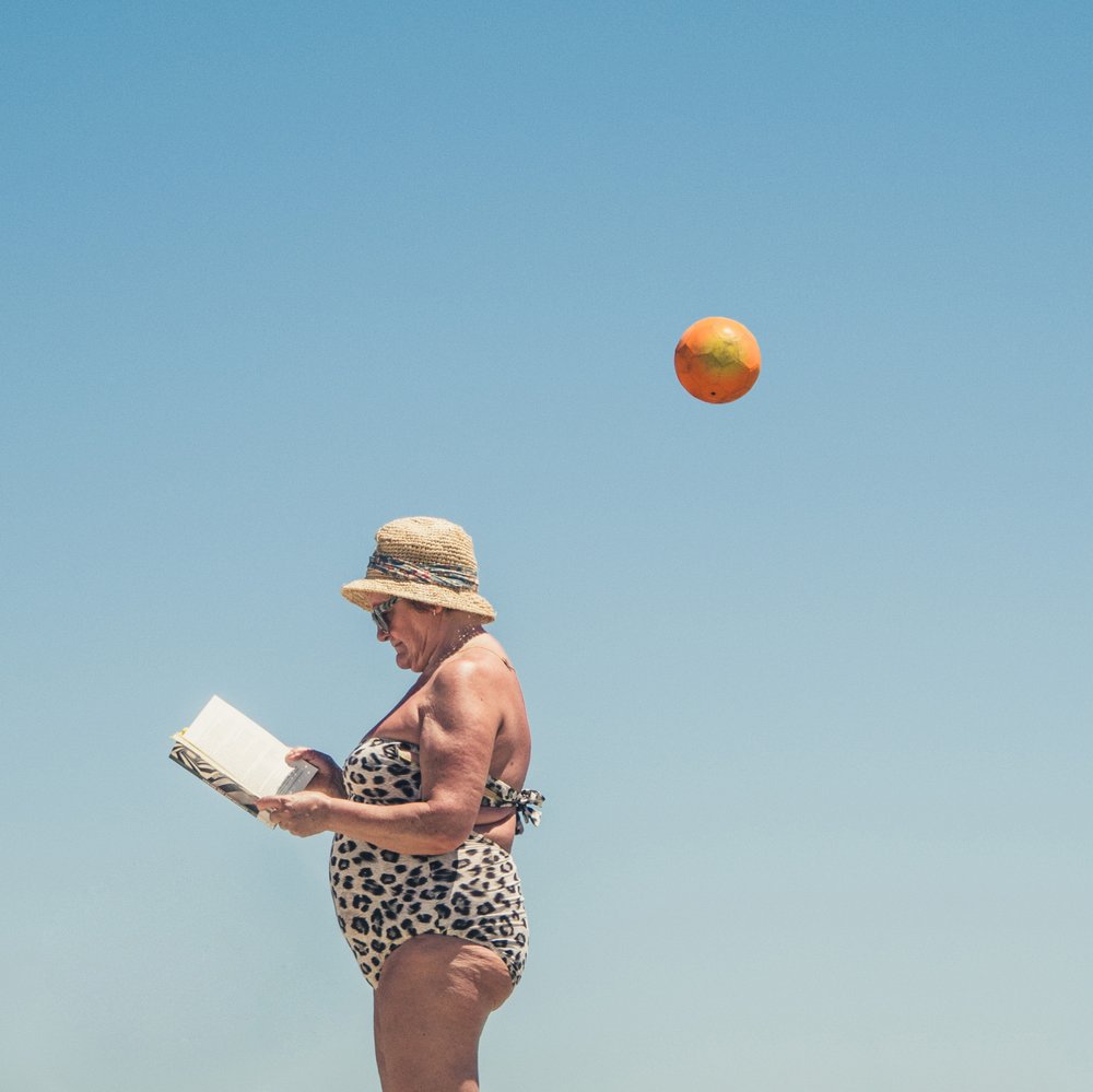 Woman Reading Sunny Sky