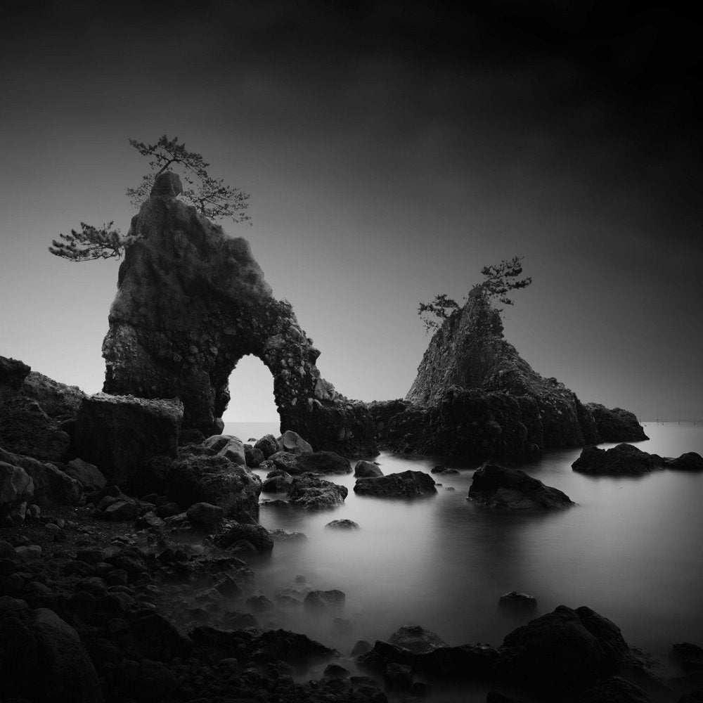 Misty Coastal Arch