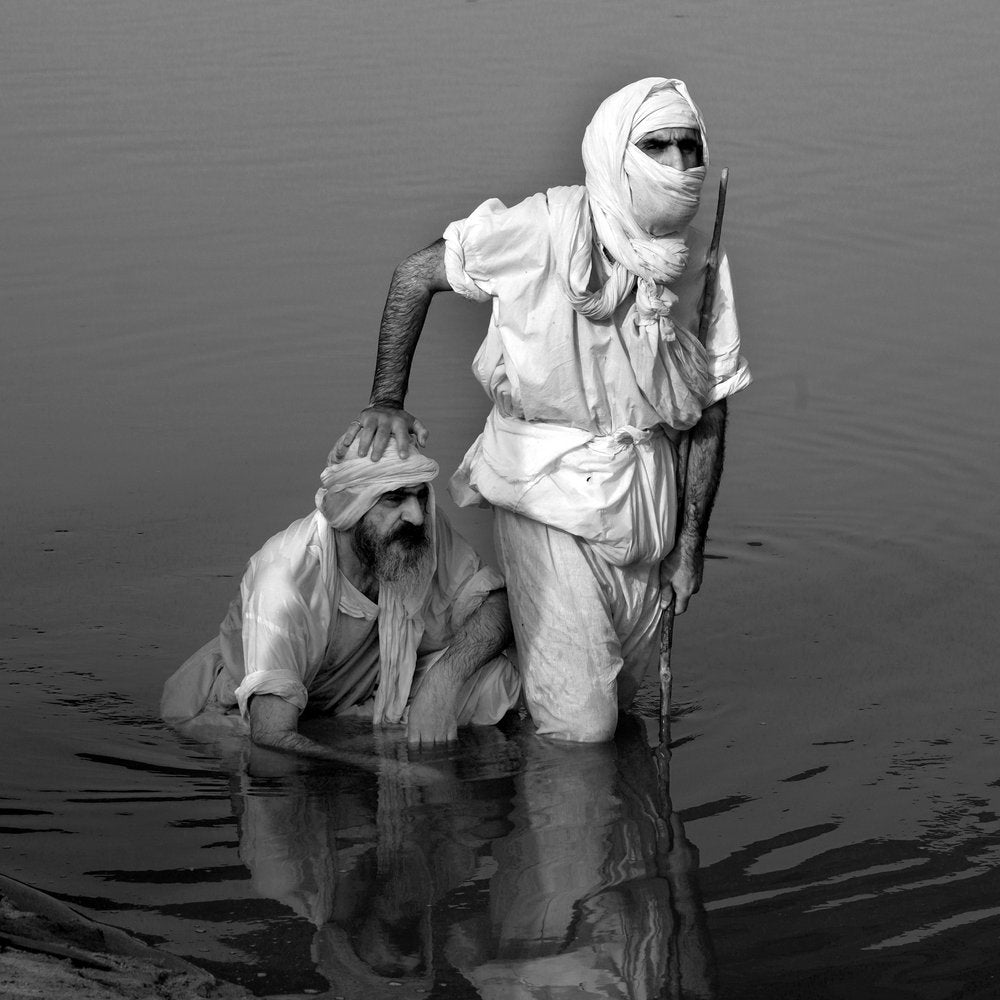 Men In Sacred Waters