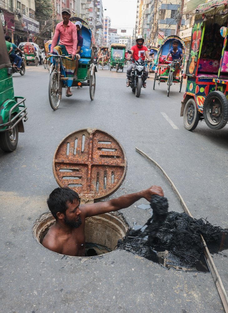 City Street Drain Worker