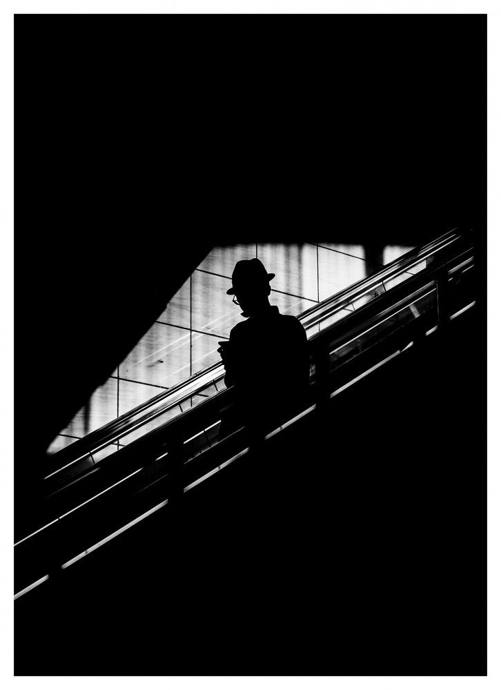 Mysterious Man Escalator